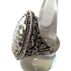 Statement ring oval ornate hammered metal